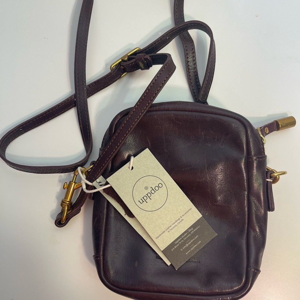 Brown Sling Bag with Smooth Leather and Compact Shape